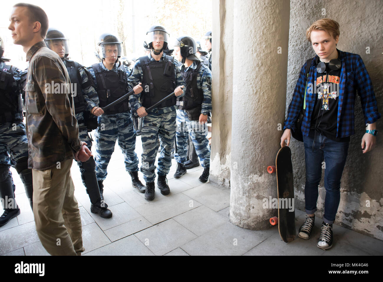 Police officers in riot gear at Pushkin Square during an opposition protest rally ahead of President Vladimir Putin's inauguration ceremony. Stock Photo