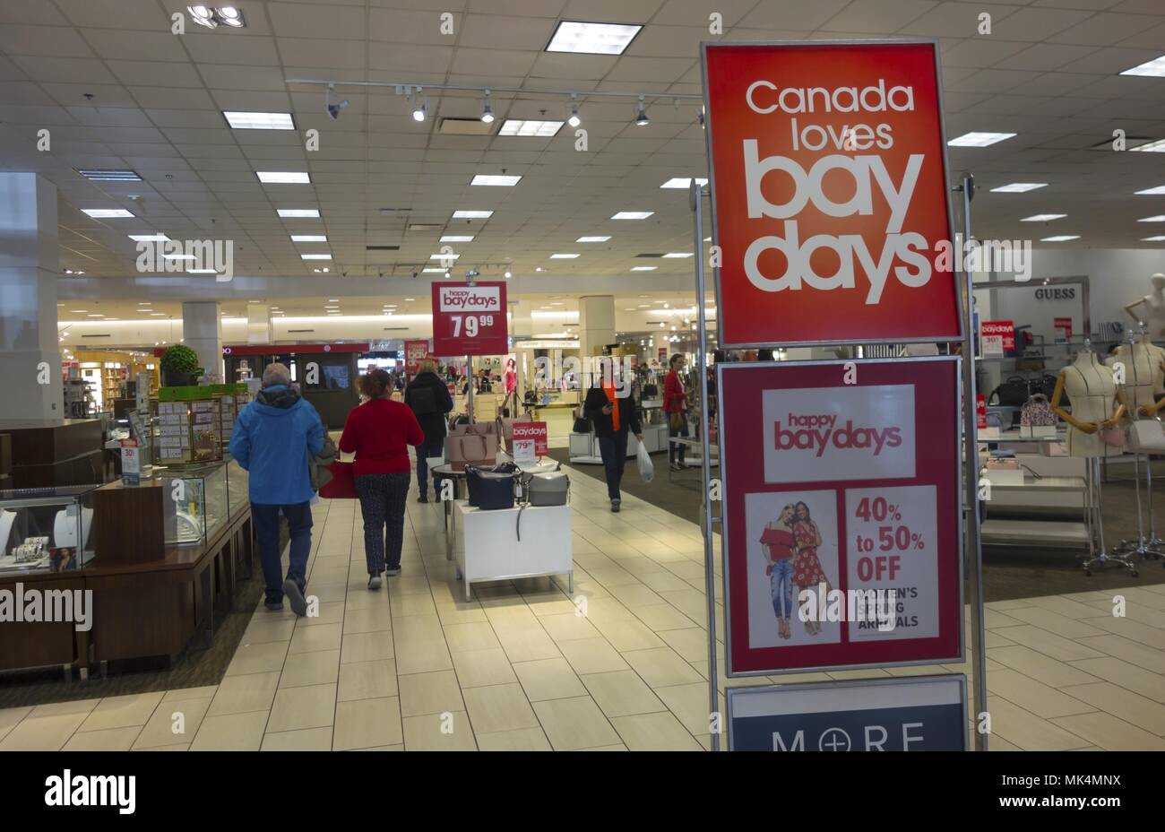 People walking in Hudson’s Bay Retail Store Interior during Bay Days Sale in Calgary, Alberta Market Mall shopping centre Stock Photo