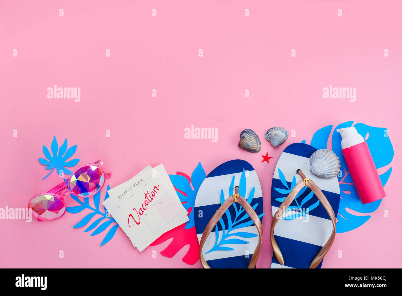 Feminine summer vacation essentials concept. Flip flops, sunglasses and ...