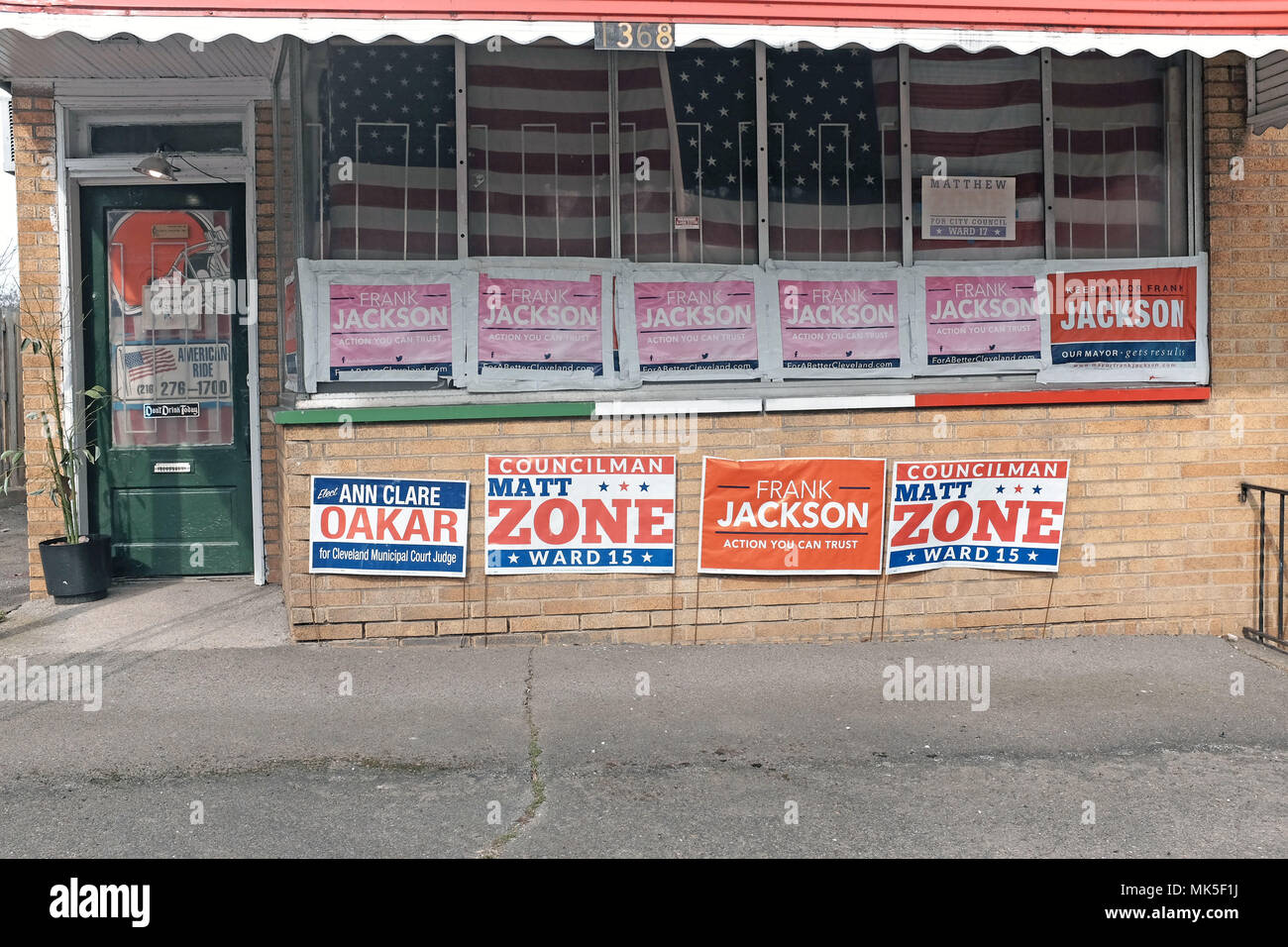 House/business displays political election signs in Cleveland, Ohio for the May 2018 primaries. Stock Photo