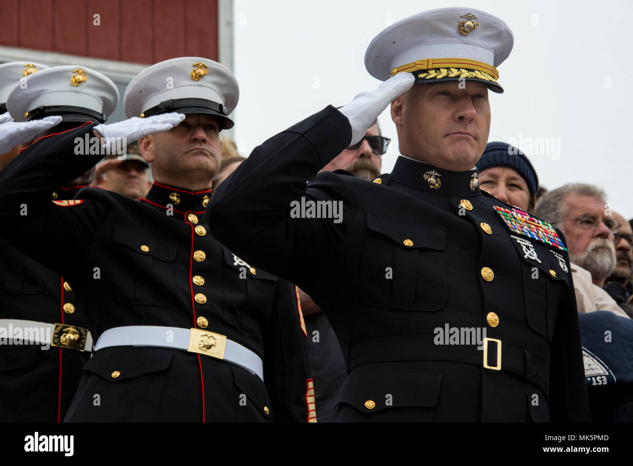 U.S. Marine Corps Brig. Gen. Julian D. Alford right commanding