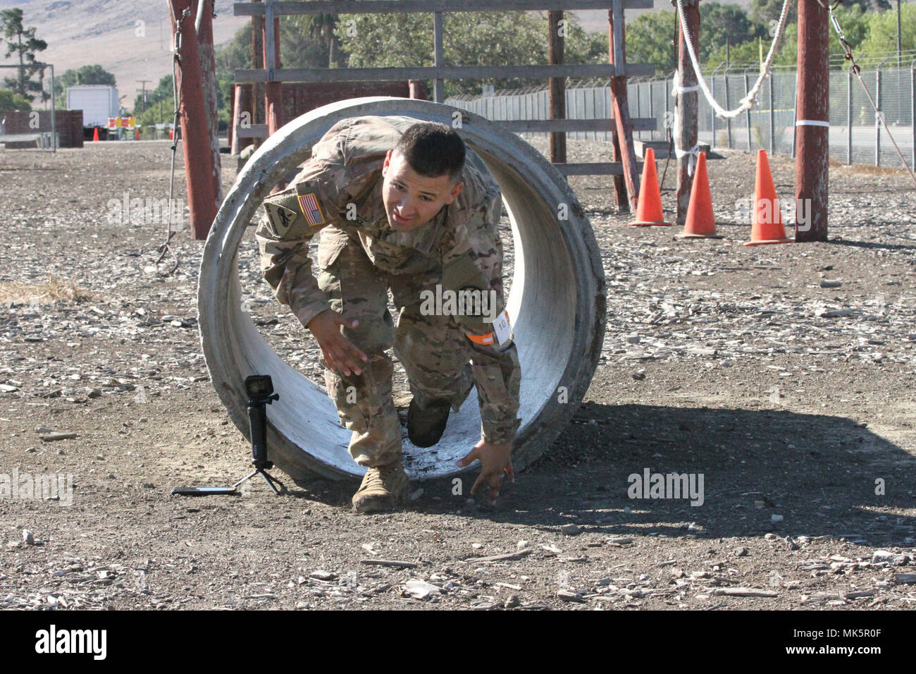 Sgt. George Ruiz exits a tunnel in the obstacle course of the California Army National Guard's 2017-18 Best Warrior Competition at Camp San Luis Obispo, California. (Army National Guard photo by Staff Sgt. Eddie Siguenza) Stock Photo