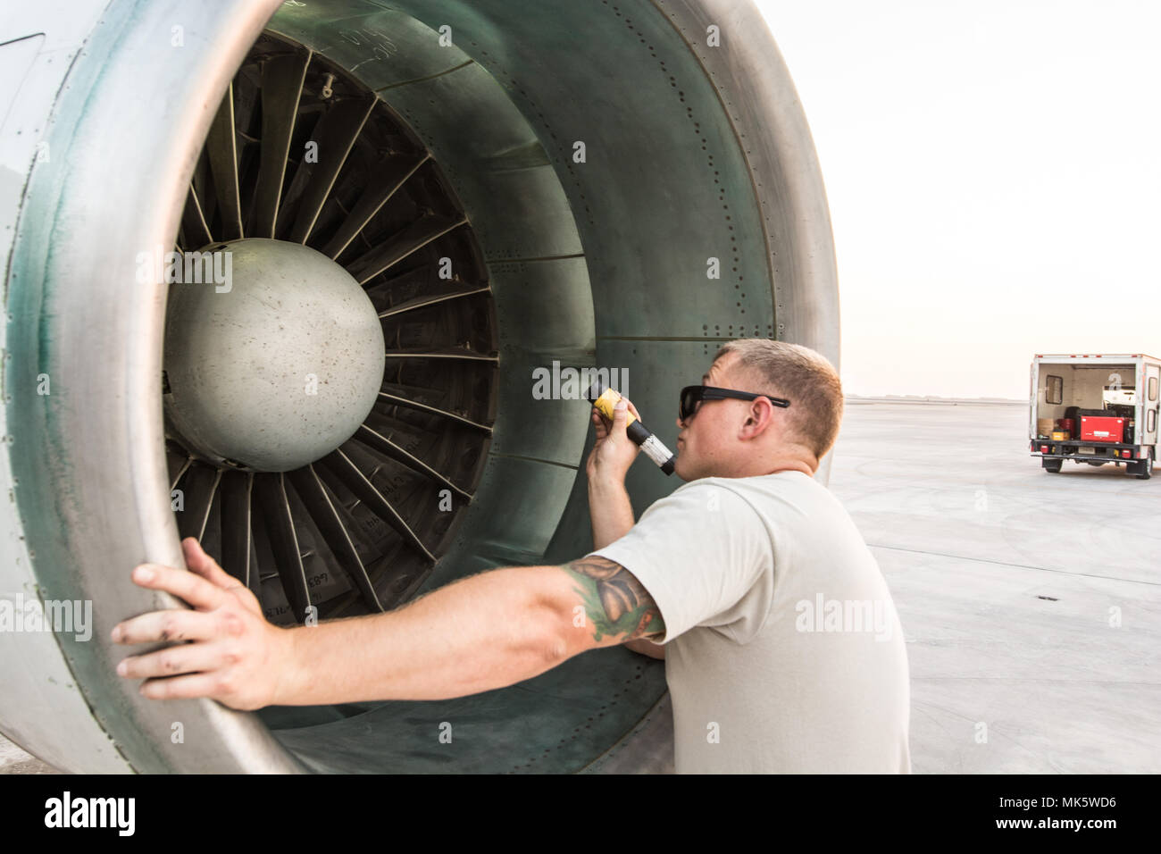 U.S. Air Force Staff Sgt. Daniel Spear, aerospace propulsion craftsman  assigned to the 7th Aircraft Maintenance Unit, performs post-flight  inspections of the intake and exhaust systems on an E-8C Joint Surveillance  Target