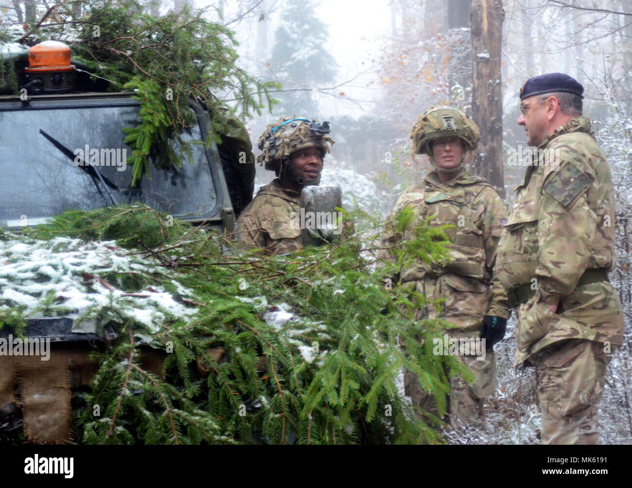 Despite the snow, British soldiers with the 1st Battalion, Royal Regiment of the Fusiliers participated in training at the U.S. Army's Joint Multinational Readiness Center in Hohenfels, Germany, as part of Allied Spirit VII, 12 Nov. 2017. Approximately 4,050 service members from 13 nations are participating in exercise Allied Spirit VII at 7th Army Training Command’s Hohenfels Training Area, Germany, Oct. 30 to Nov. 22, 2017. Allied Spirit is a U.S. Army Europe-directed, 7ATC-conducted multinational exercise series designed to develop and enhance NATO and key partner’s interoperability and rea Stock Photo