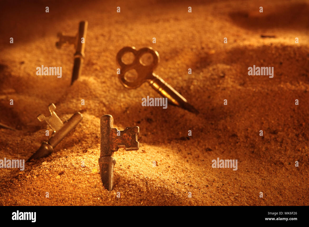 Skeleton keys in the sand Stock Photo Alamy