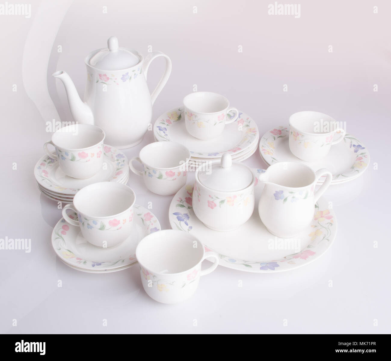 teapot and cup set . teapot and cup set on a background Stock Photo Alamy