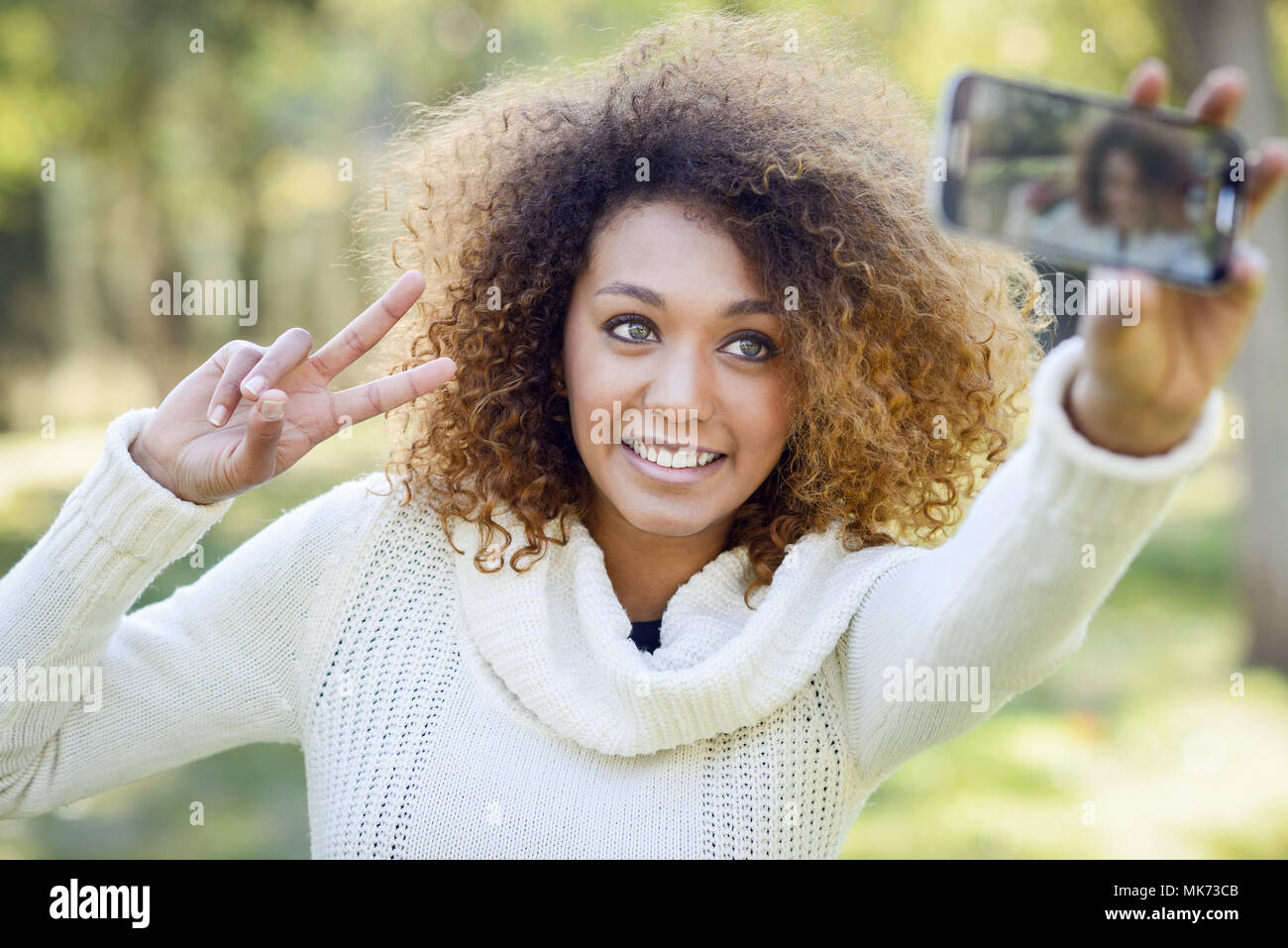 Beautiful Young African American Woman With Afro Hairstyle And