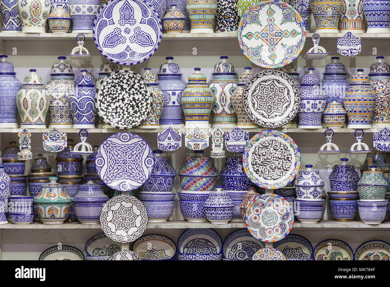 Traditional arabic handcrafted, colorful decorated plates in Morocco