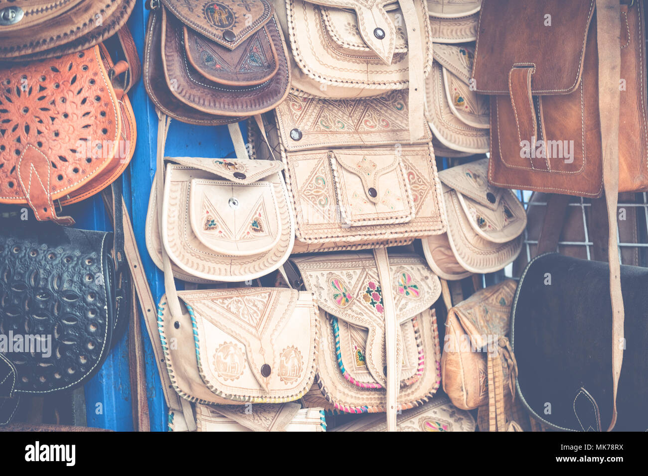 Moroccan leather goods bags and slippers at outdoor market in Marrakesh, Morocco Stock Photo Alamy