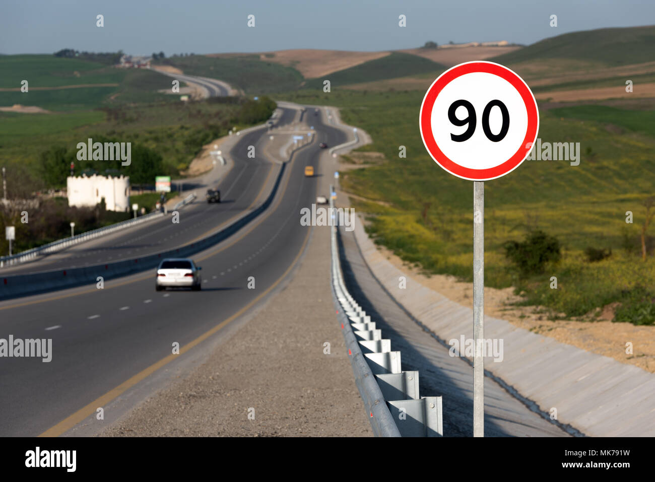 speed-limit-90-road-sign-on-highway-stock-photo-alamy