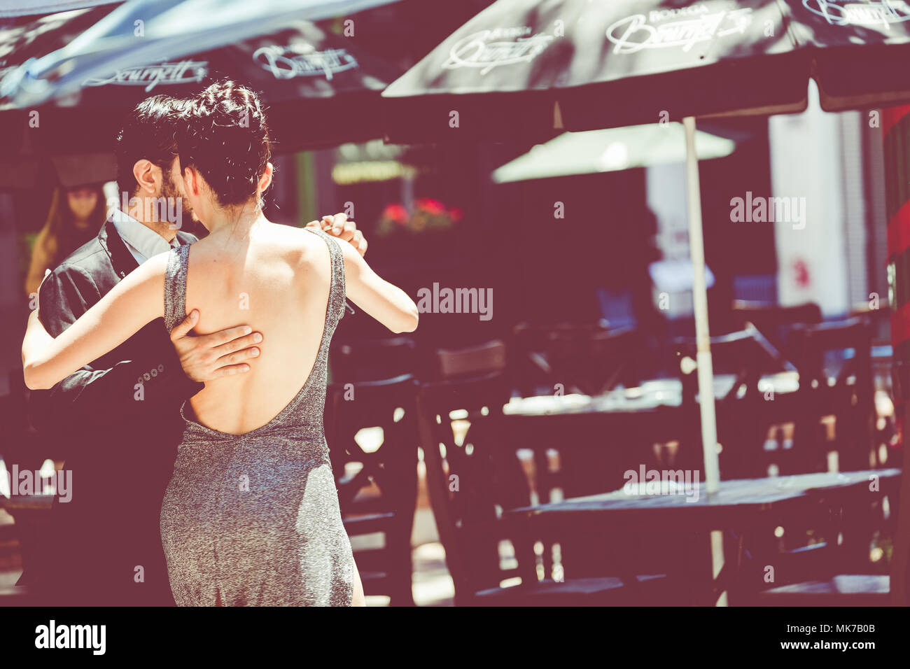 BUENOS AIRES, ARGENTINA - JANUARY 30, 2018: Unidentified couple dancing tango in the street in Buenos Aires, Argentina. Stock Photo