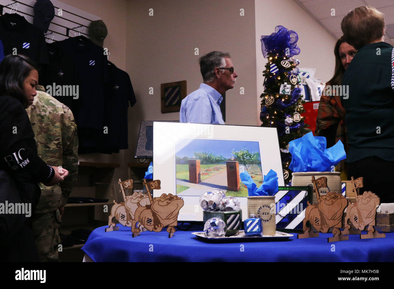 Soldiers, retirees and civilians browse the gift shop within the the