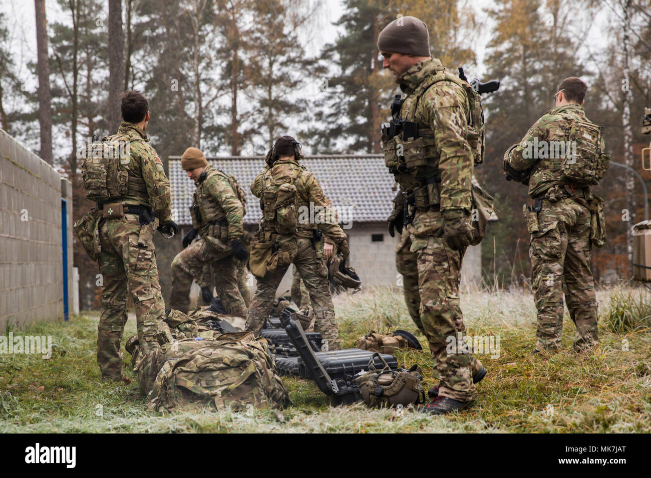 Green Berets assigned to 1st Battalion, 10th Special Forces Group  (Airborne), organize their equipment before a Special Forces Advanced Urban  Combat (SFAUC) training exercise near Stuttgart, Germany, Nov. 16, 2017.  The SFAUC