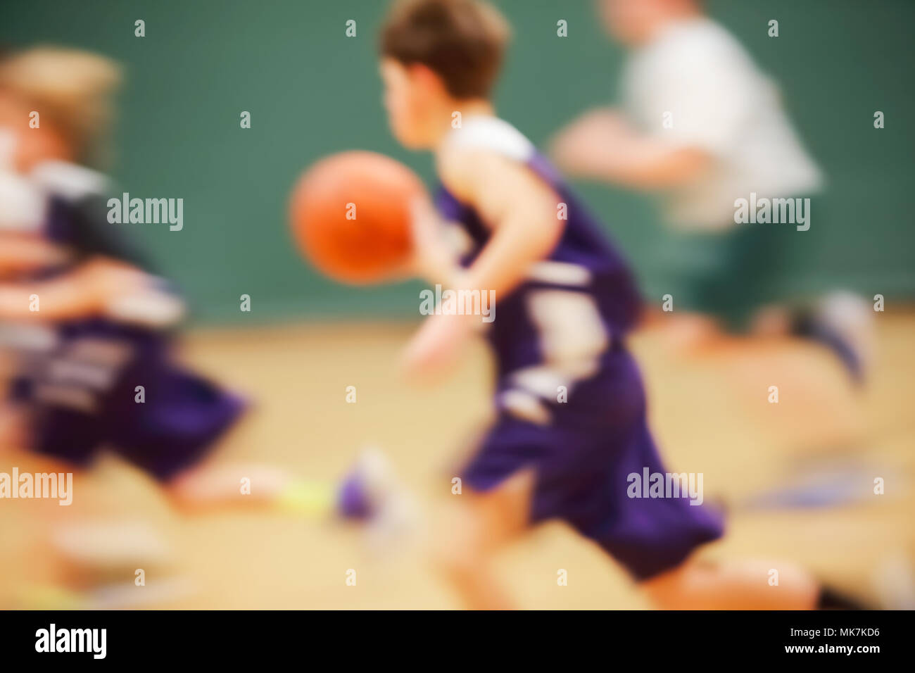 Motion blurred basketball game Stock Photo