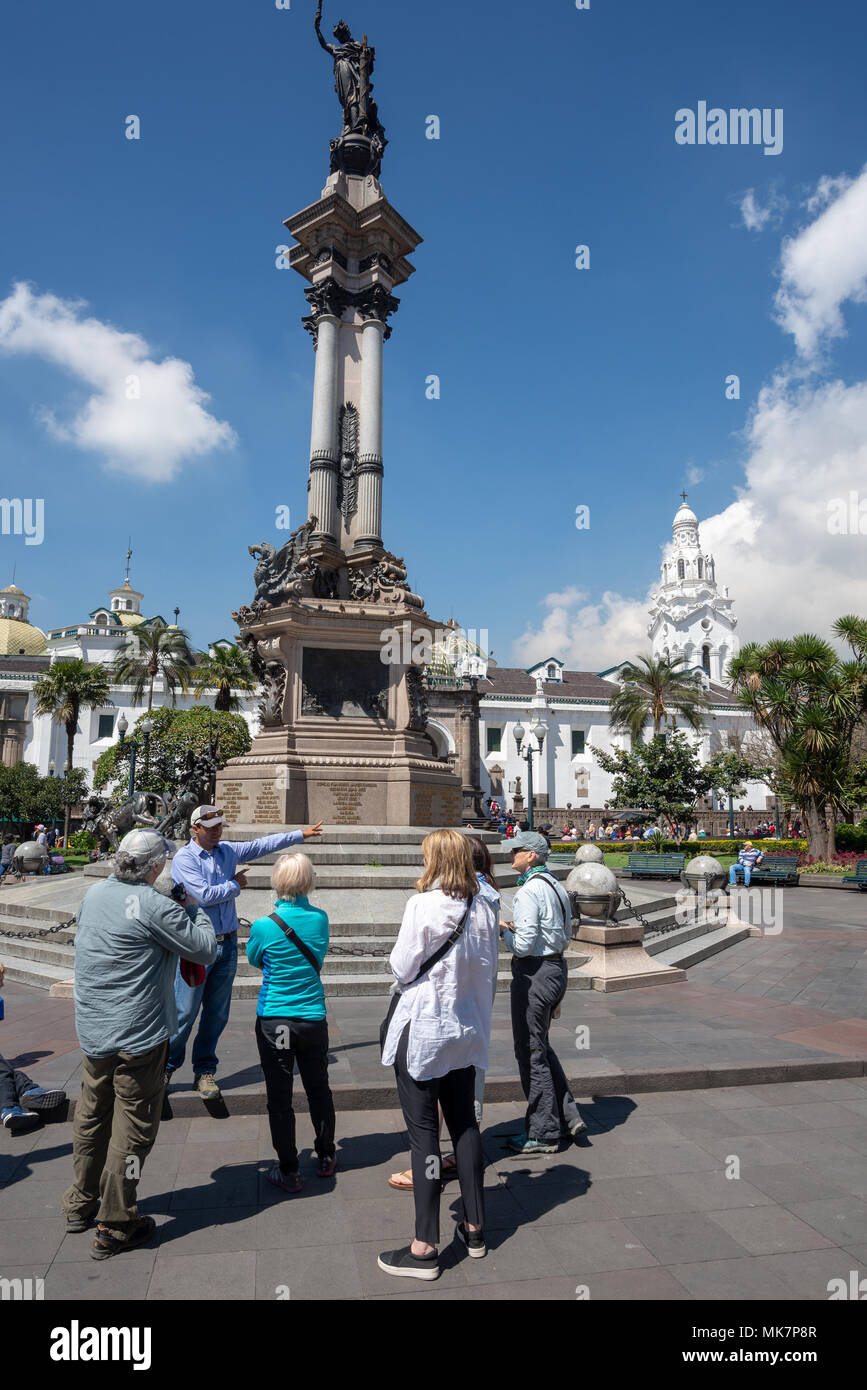 Tour guide and group at Heroes de la Independecia, a monument to the heroes at the start of Ecuador's war for independence from Spain in 1820, in Inde Stock Photo