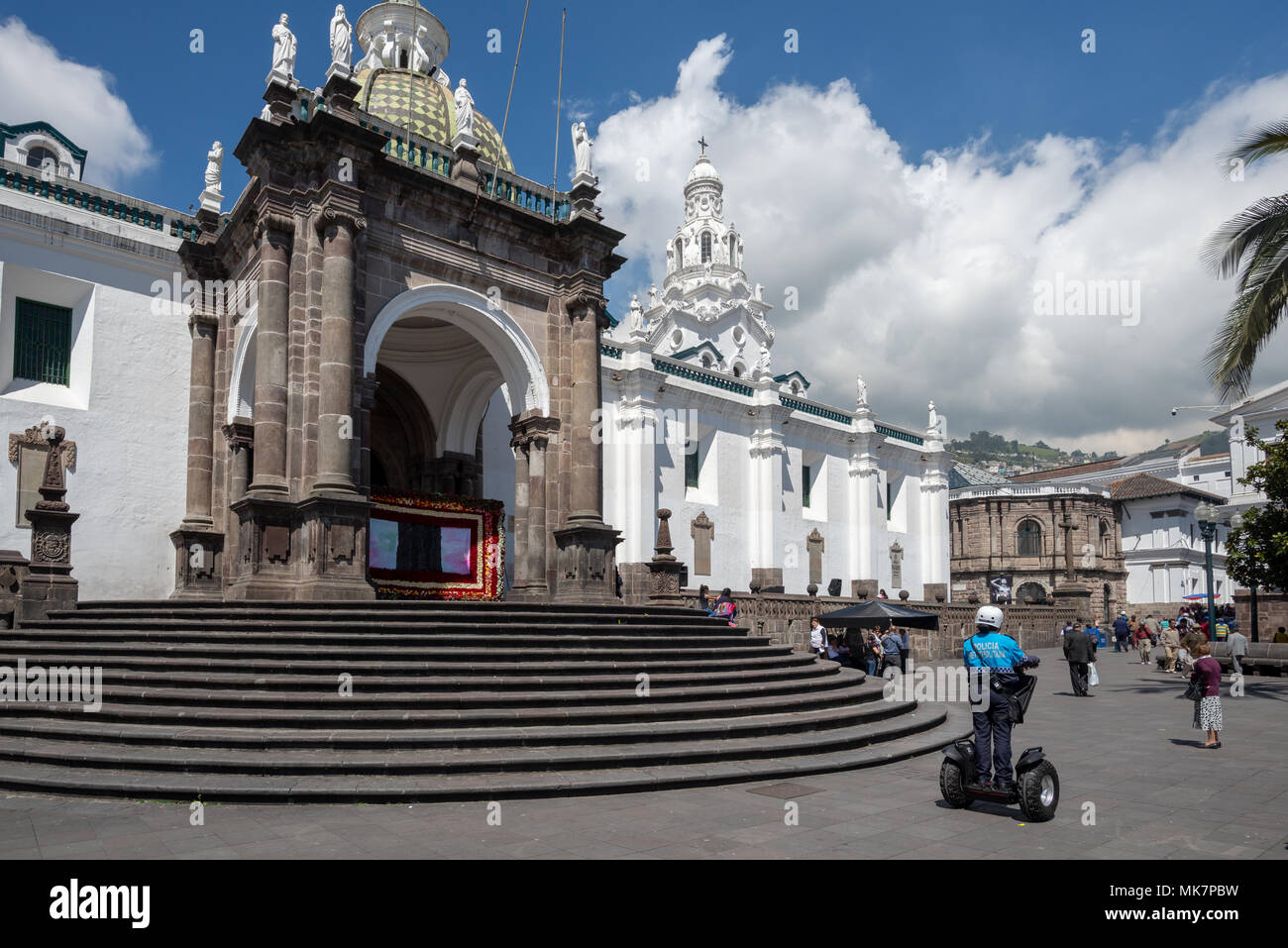 Policewoman on a Segway in front of the Cathedral of Quito in the historic old city of Quito, Ecuador. Stock Photo