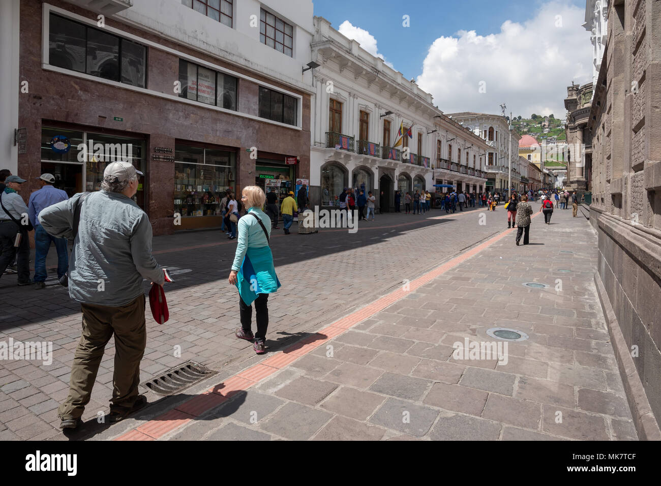 Pedestrians in the historic old city of Quito, Ecuador. Stock Photo