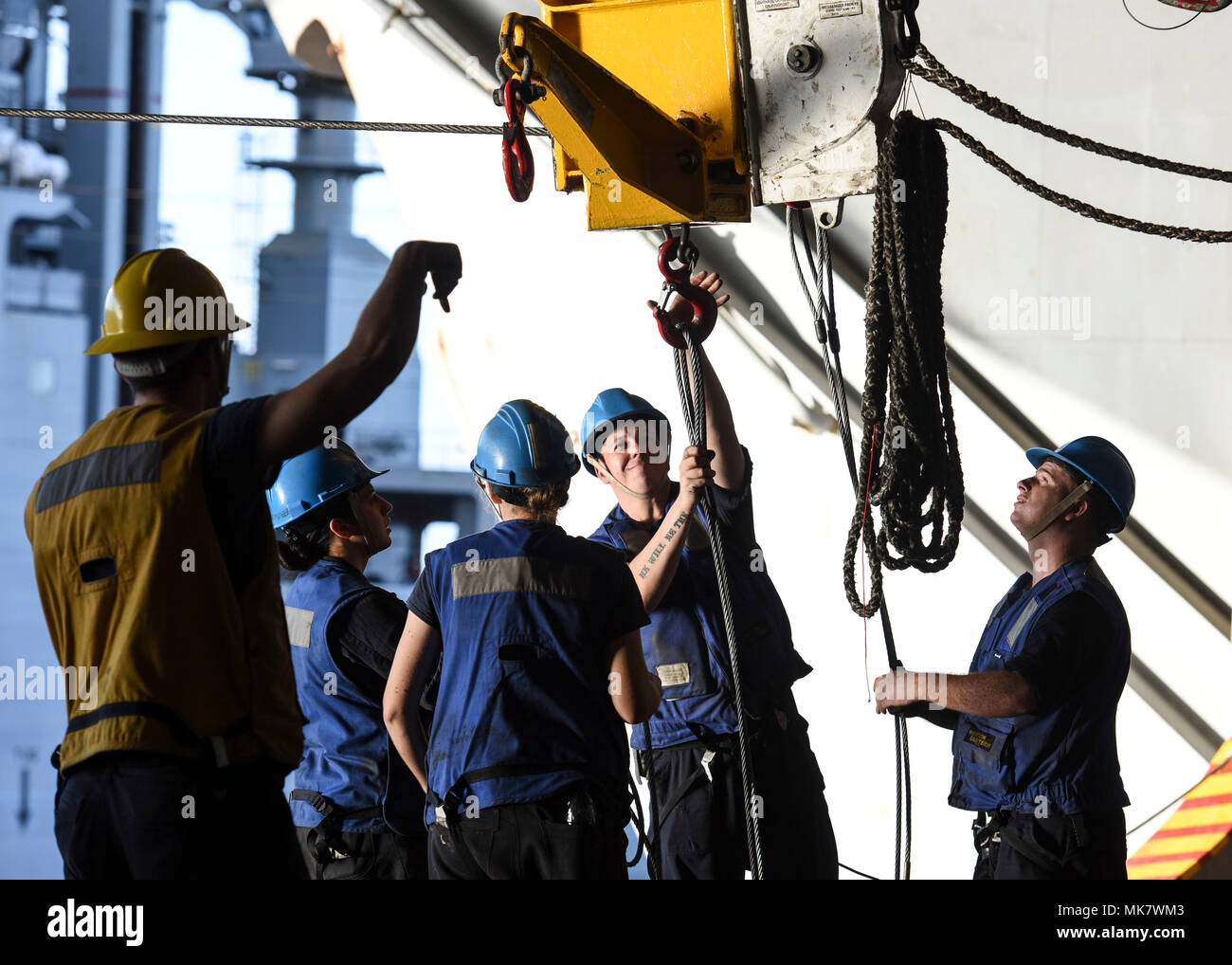 PACIFIC OCEAN (Nov. 21, 2017) U.S. Navy Sailors rig ordnance during an ...