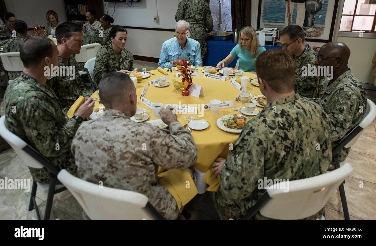 The Secretary of the Navy Richard V. Spencer and his wife, Mrs. Sarah Pauline Finch Spencer, had breakfast with troops and toured Camp Lemonnier’s facilities during a visit to the base, Nov. 24, 2017. While on base, Mrs. Spencer toured the Emergency Medical Facility, enlisted barracks, Fitness Center, Navy Exchange and galley. (U.S. Air National Guard photo by Staff Sgt. Allyson L. Manners) Stock Photo