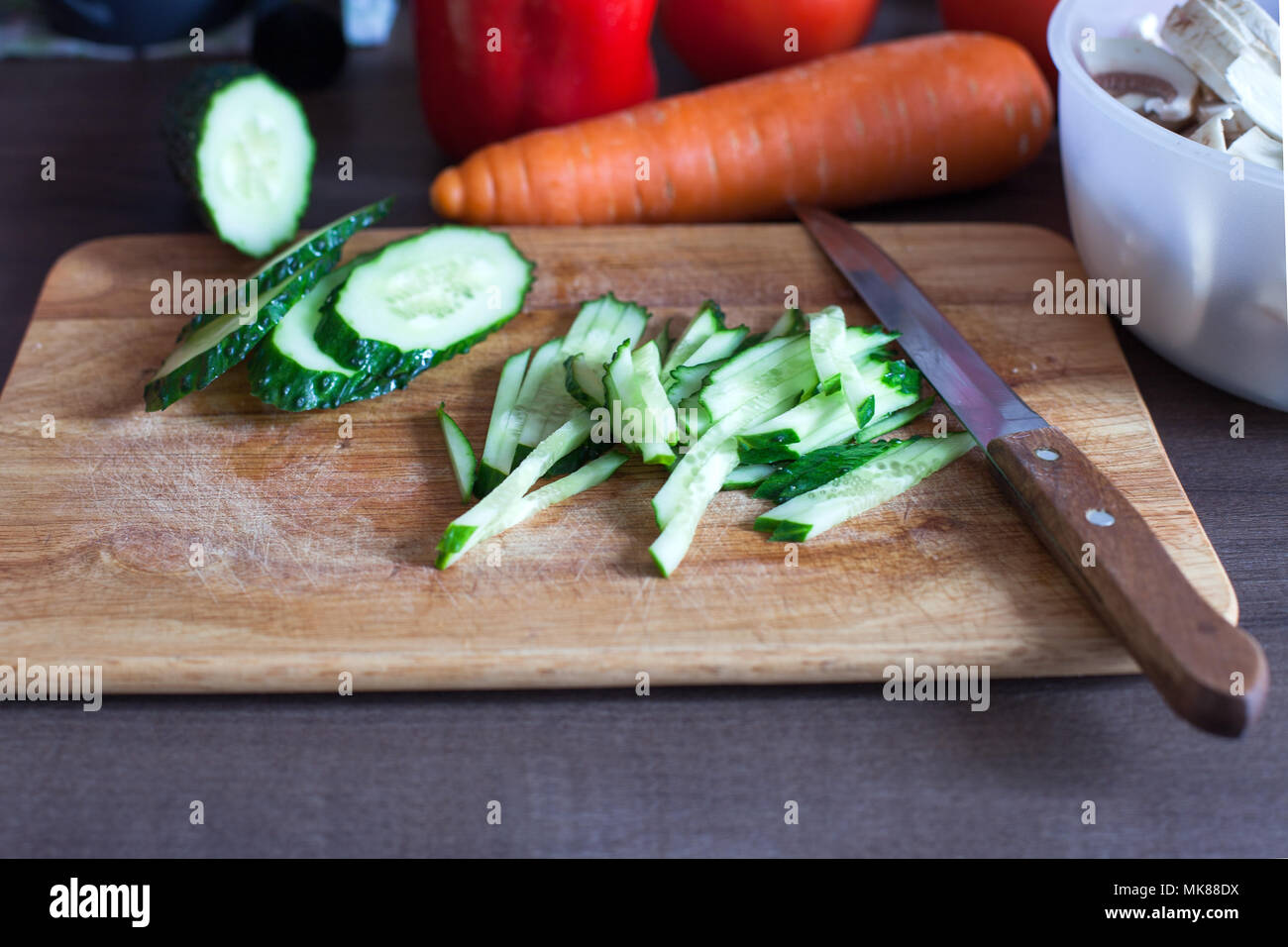mise en place setup of ingredients for dinner on wooden cutting board before preparation, bacground diet lifestyle Stock Photo