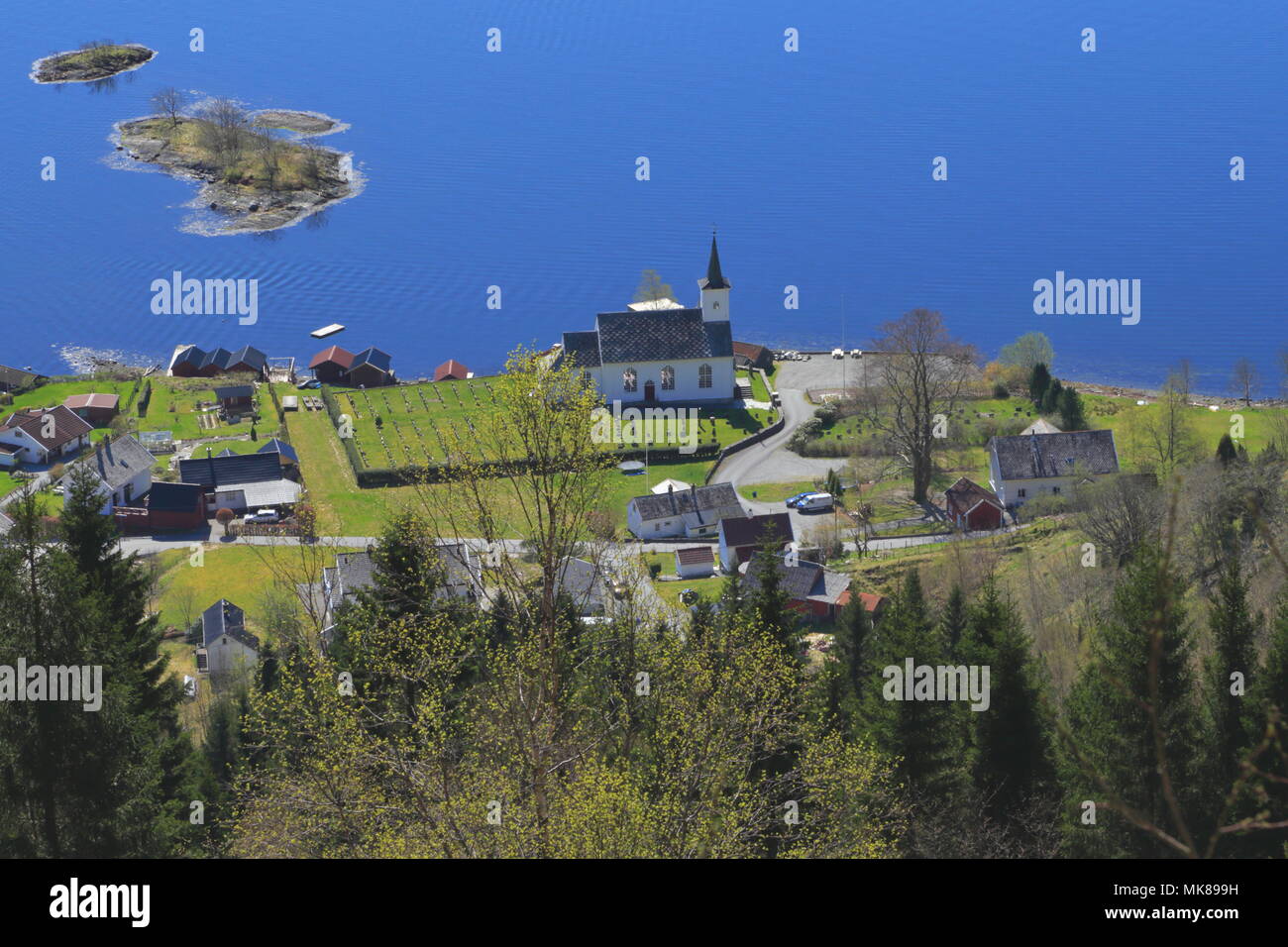 View Over The Small Village Of Bruvik On The Island Of Osteroy In Hordaland Norway On April 20 2014 Bruvik Church And Cemetery Is In View Stock Photo Alamy