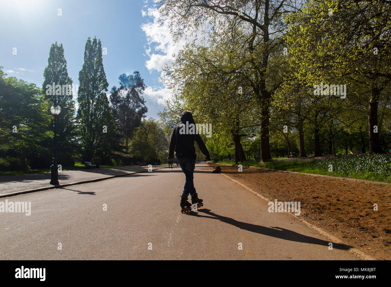 A very cool rollerblader in Hyde Park, Central London Stock Photo