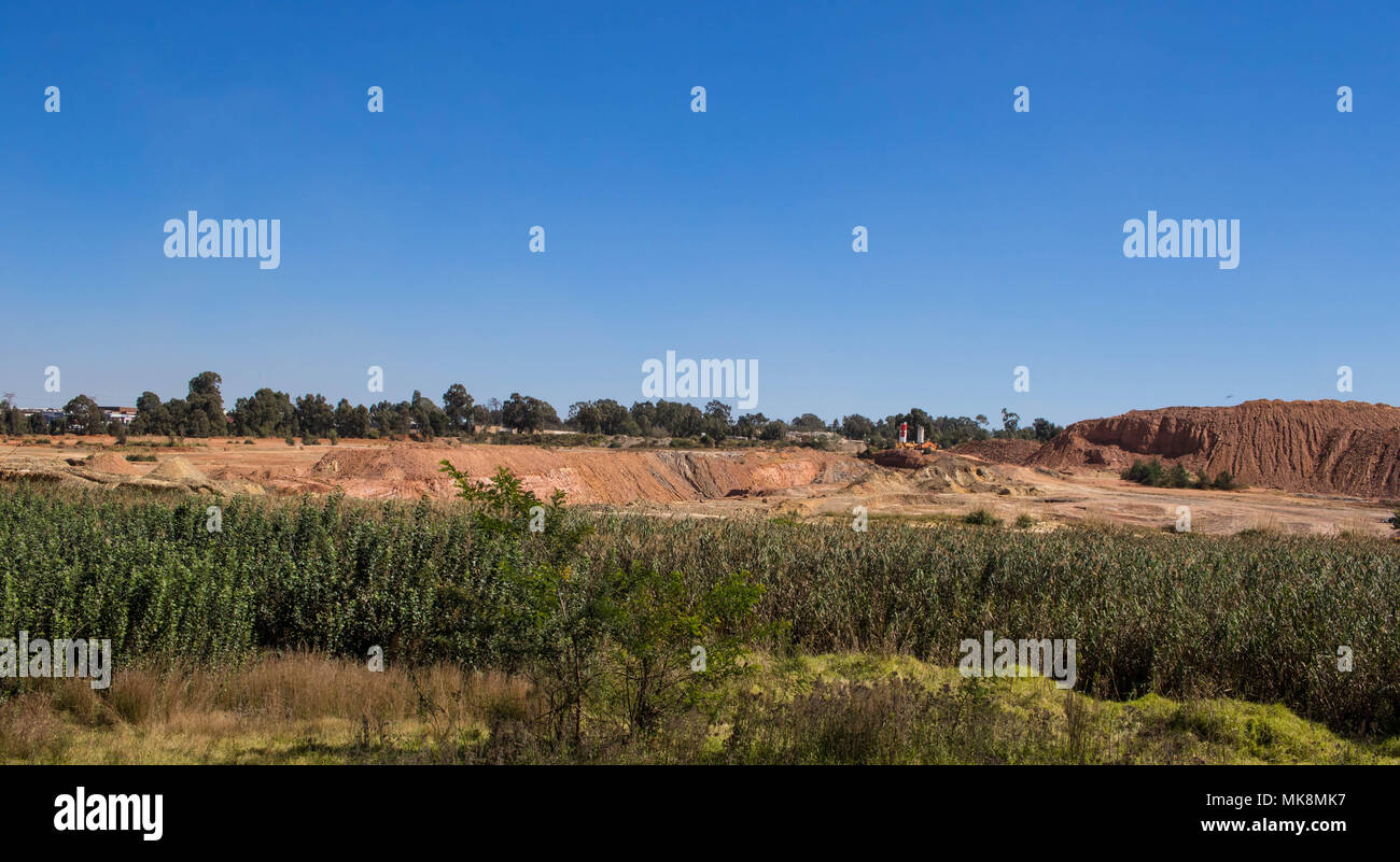 Reclamation has removed most of the historic gold mining dumps around the city of Johannesburg in South Africa image with copy space Stock Photo