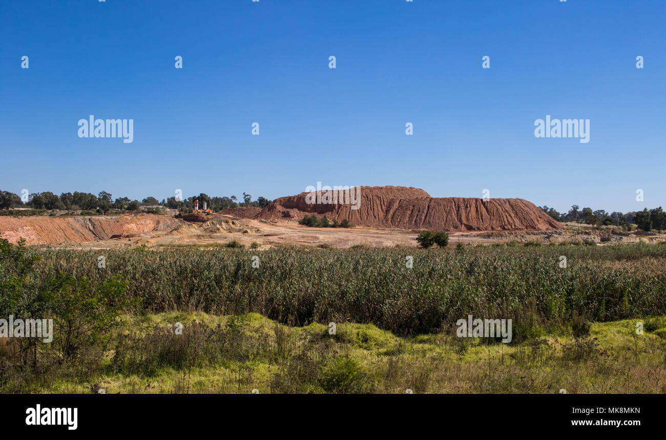 Reclamation has removed most of the historic gold mining dumps around the city of Johannesburg in South Africa image with copy space Stock Photo