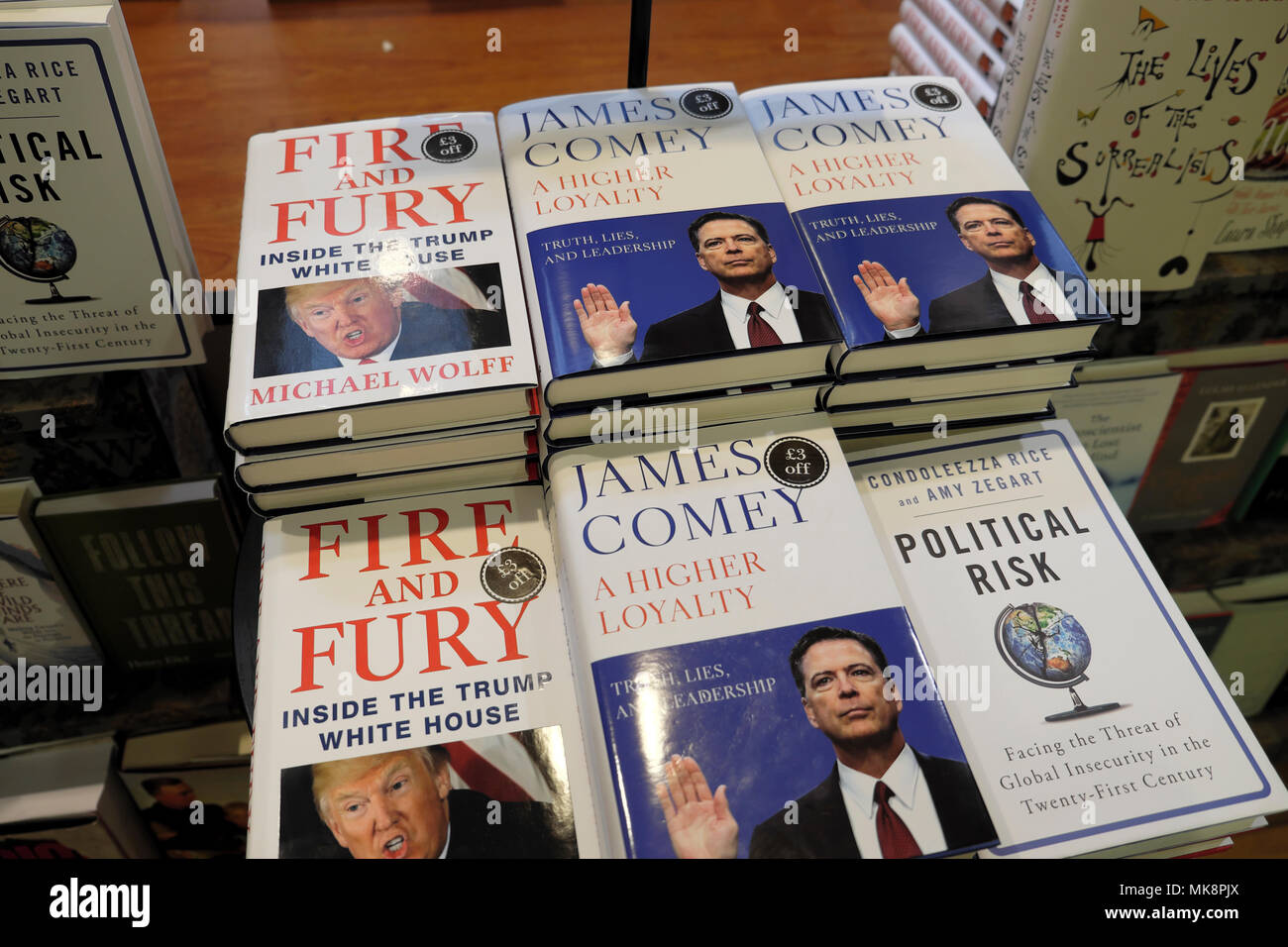'Fire and Fury' Michael Wolfe book and 'A Higher Loyalty' James Comey books focussing on Donald Trump behaviour for sale in bookstore UK  KATHY DEWITT Stock Photo