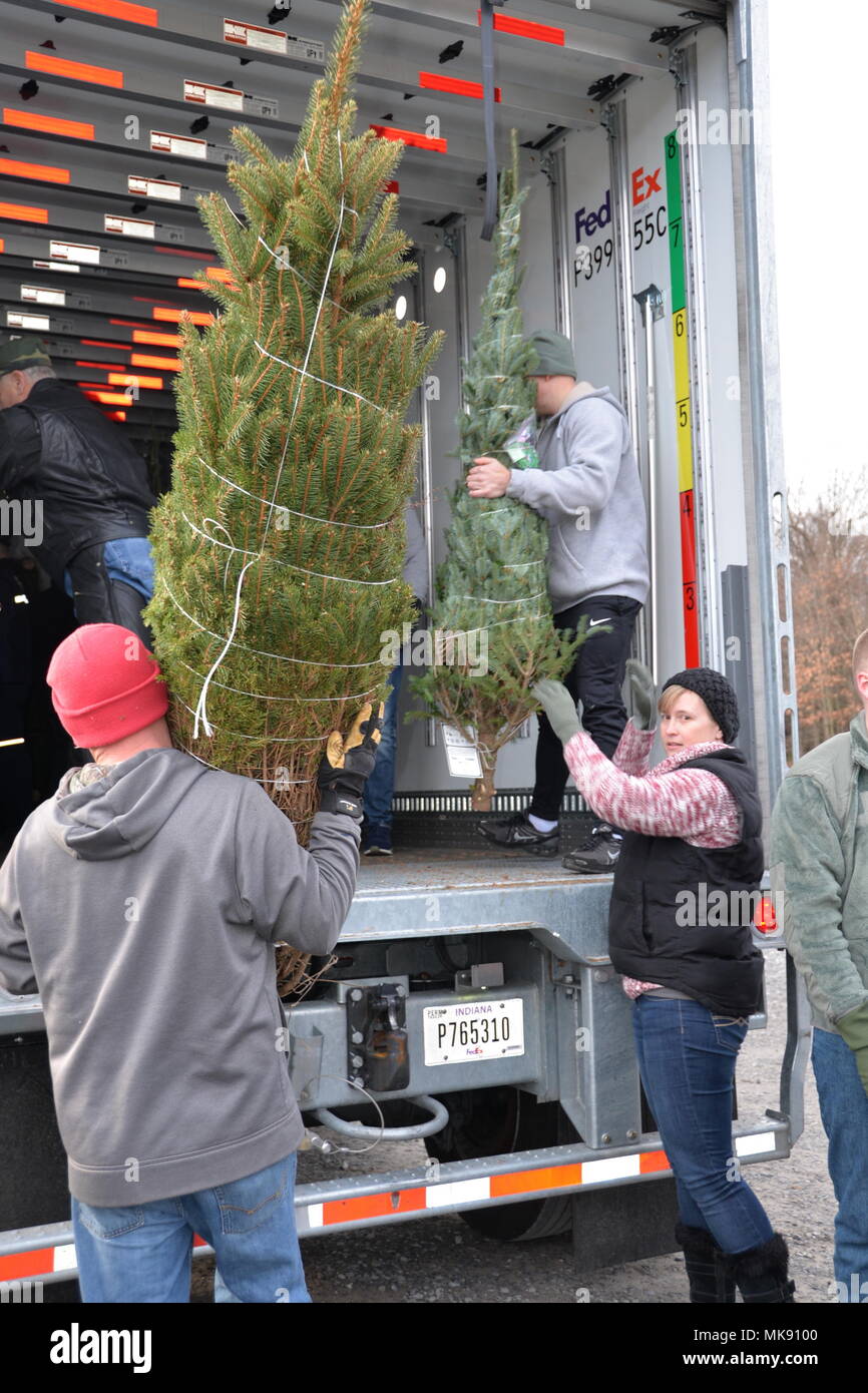 New York Air National Guard Master Sgt. Jennifer Dippo, right, helps