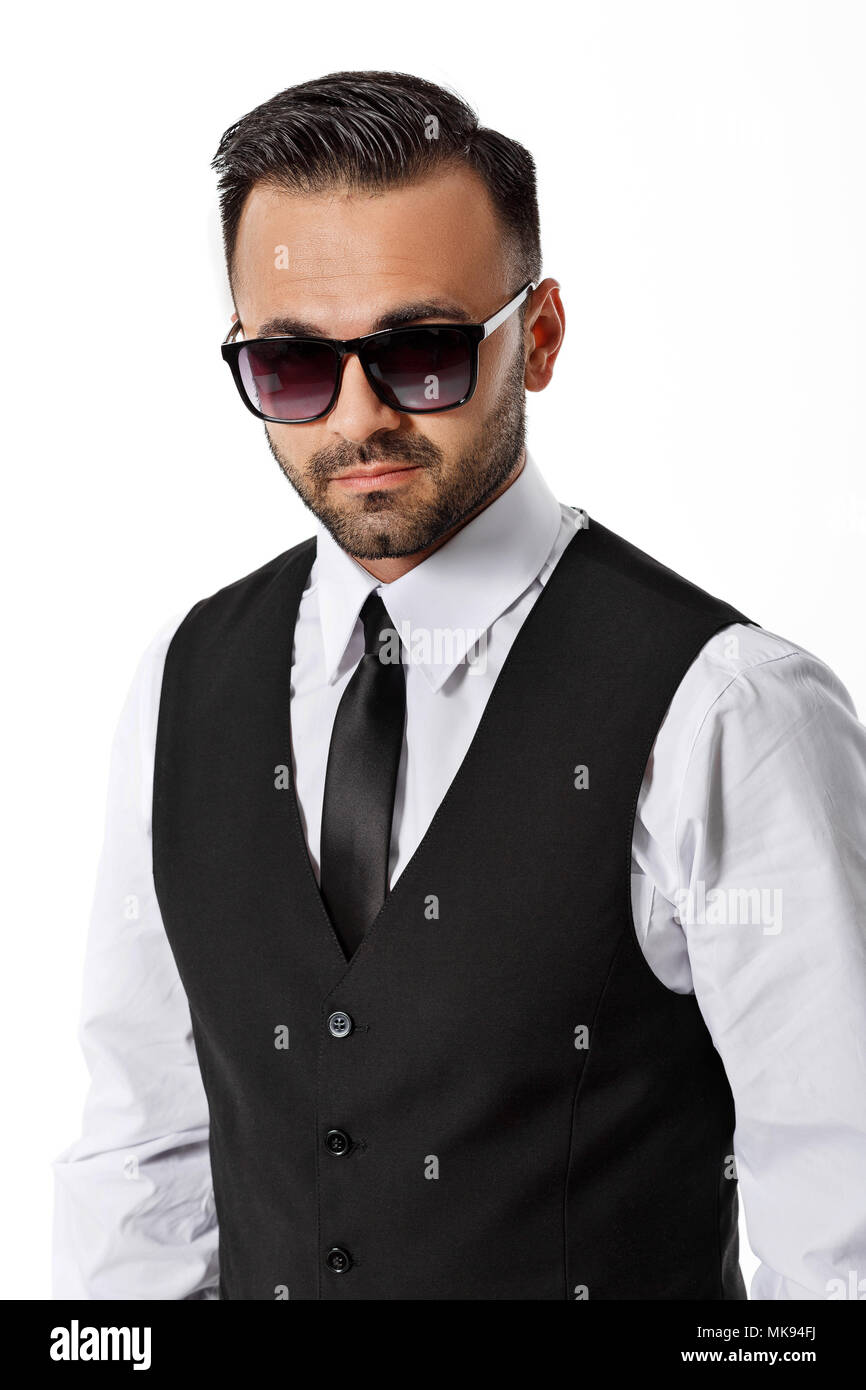 man in black suit on white background Stock Photo - Alamy