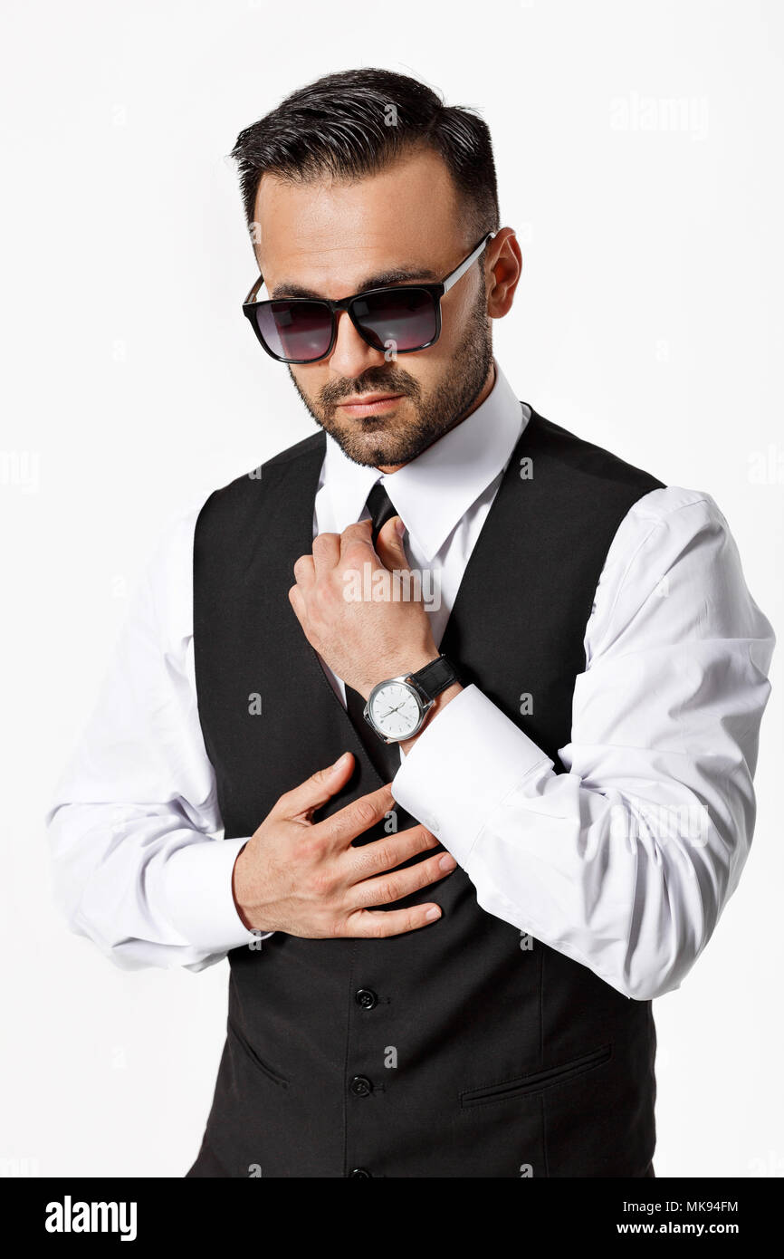 man in black suit on white background Stock Photo - Alamy