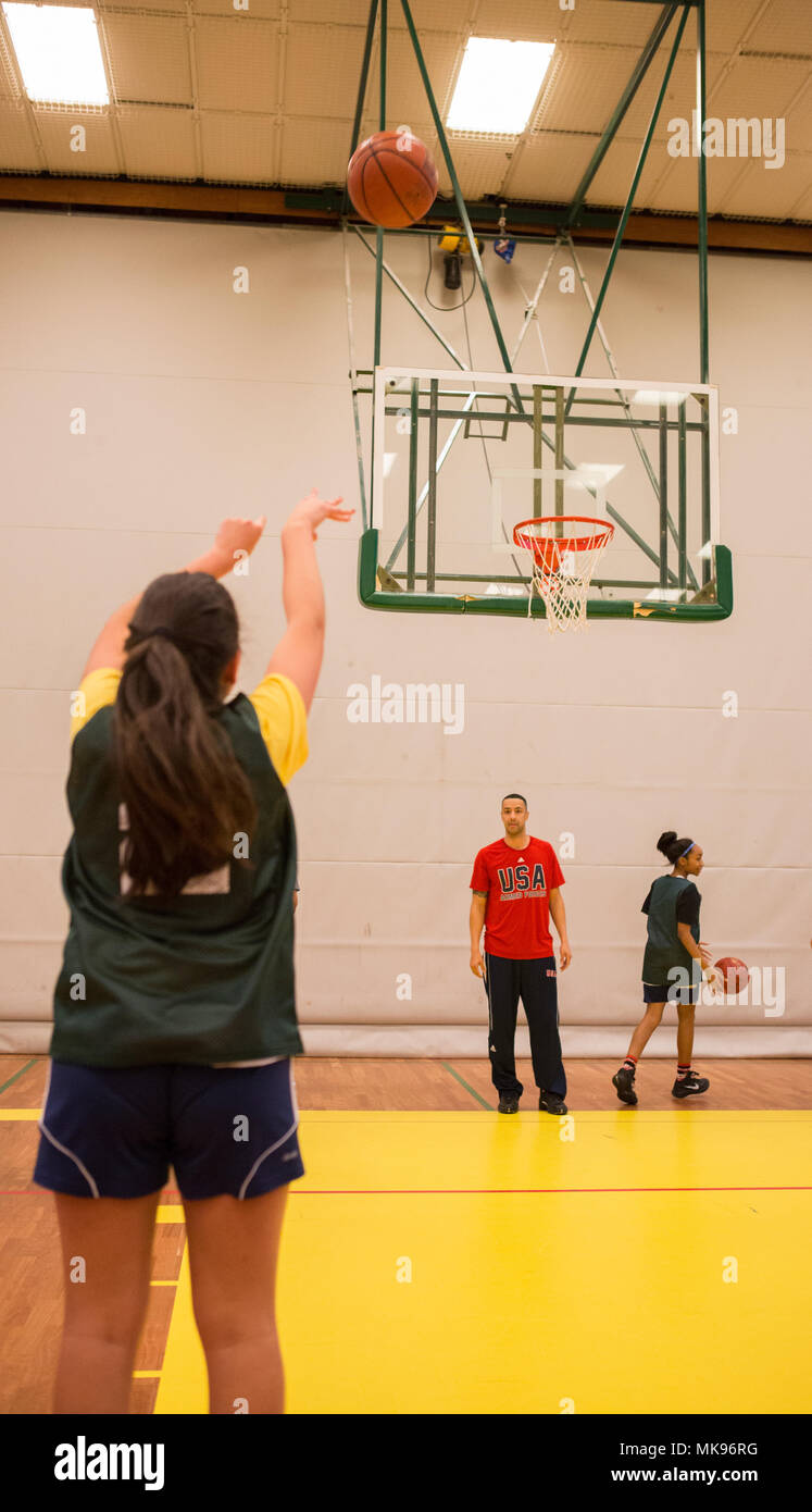 20171130 N Ej549 0057 Shape Belgium Nov 30 2017 A Member Of The Supreme Headquarters Allied Powers Europe Shape American High School Girls Basketball Team Shoots A Basket At The Shape American High School Gym