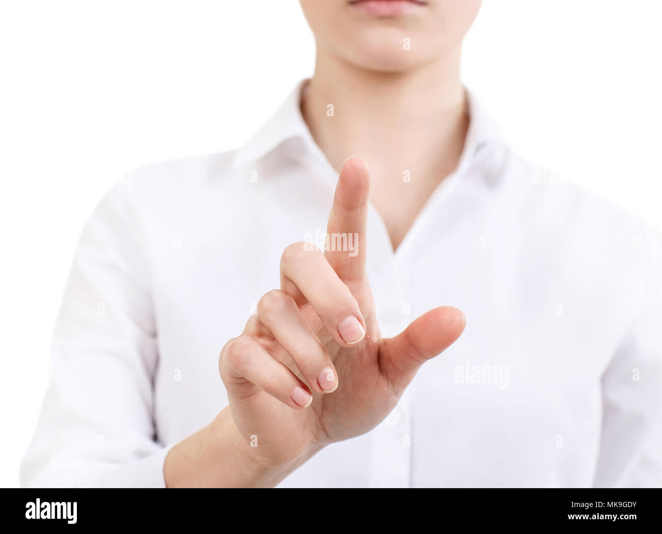 Woman in white blouse pointing with finger. Stock Photo