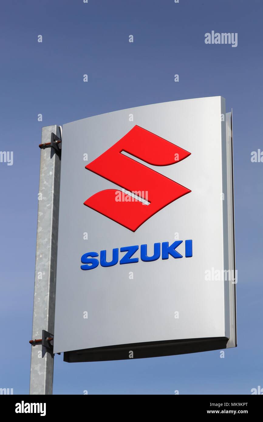 Horsens, Denmark - April 2, 2018: Suzuki logo on a panel. Suzuki is a Japanese multinational corporation Stock Photo