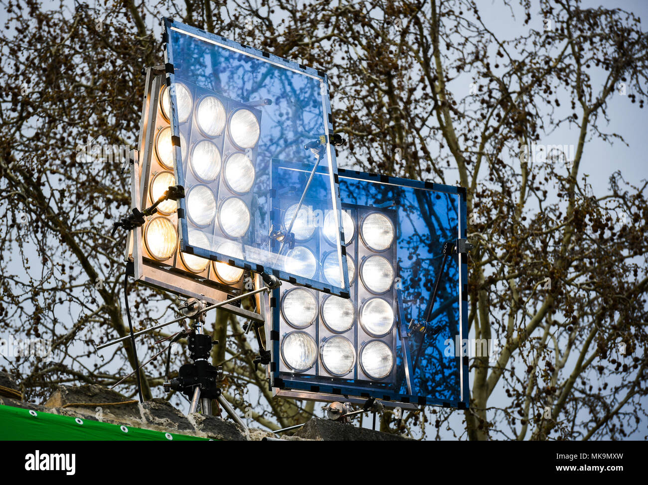 Professional movie light system with blue filter on outdoor set. Big