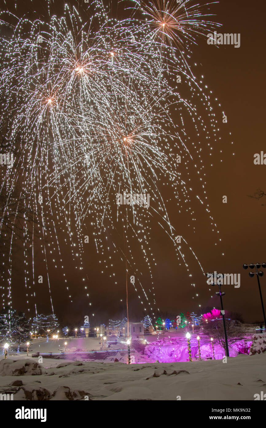Falls Park in Sioux Falls, South Dakota lights fireworks for New Years