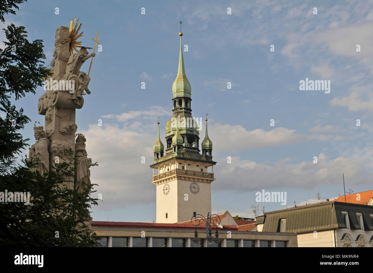 Holy Trinity Column (Sloup Nejsvětější Trojice) and the tower of the Old Town Hall (Stará radnice) in Brno, Czech Republic Stock Photo