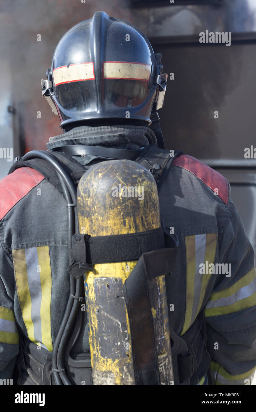Firefighter putting out fire training station extinguisher backdraft ...