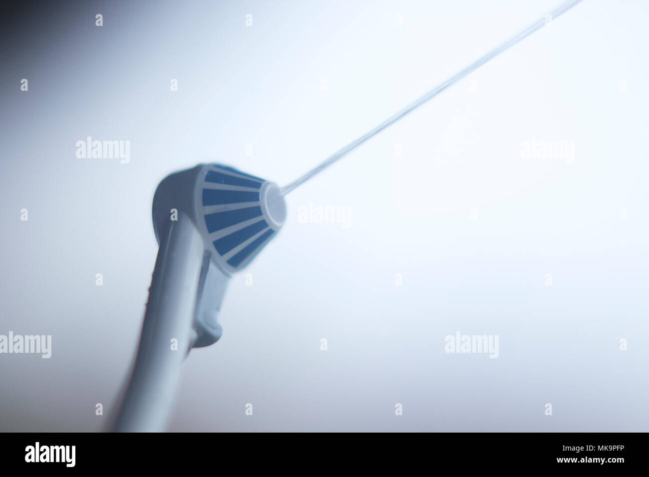 Dental water spray cleaner for interdental hygiene Stock Photo Alamy