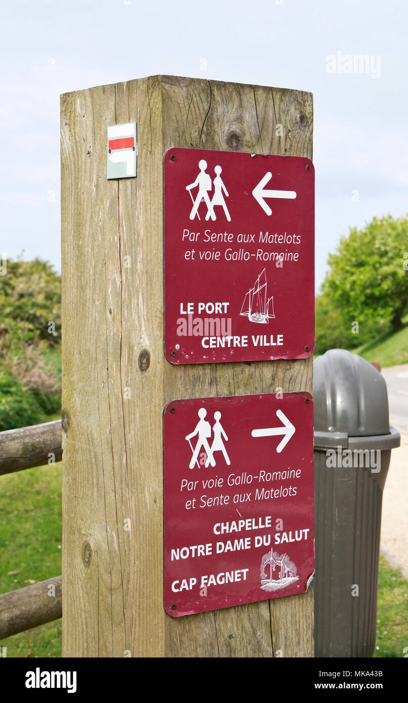 A wooden sign post on a footpath giving directions . Fecamp. Normandie, France Stock Photo