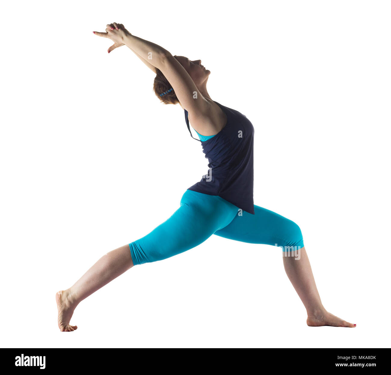 Woman making yoga exercise Stock Photo