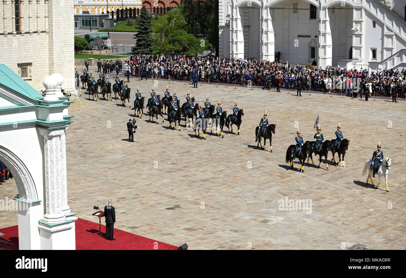 Moscow, Russia. 07th May, 2018. Russian President Vladimir Putin watches a review of the Presidential Regiment to mark his fourth inauguration on Cathedral Square in the Kremlin Grand Palace May 7, 2018 in Moscow, Russia. Putin was sworn-in for the forth time as the President of the Russian Federation. (Kremlin Pool via Credit: Planetpix/Alamy Live News Stock Photo
