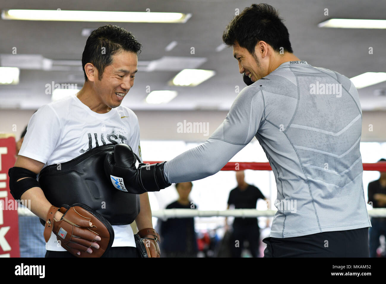 Tokyo, Japan. 7th May, 2018. (R-L) Ryota Murata, Sendai Tanaka Boxing :  Ryota Murata of Japan trains with trainer Sendai Tanaka during a media  workout at Teiken Boxing Gym in Tokyo, Japan .