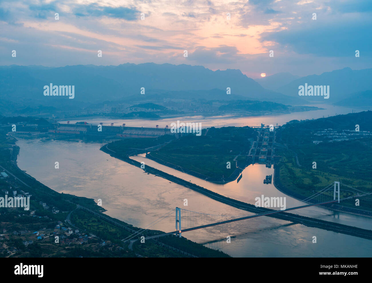 Yichang. 7th May, 2018. Aerial photo taken on May 7, 2018 shows the Three Gorges Dam in Sandouping Town of Yichang, central China's Hubei Province. The water level of the Three Gorges Reservior fell to 160 meters Tuesday morning, which is expected to fall below 145 meters before the flood season comes. Credit: Zheng Jiayu/Xinhua/Alamy Live News Stock Photo