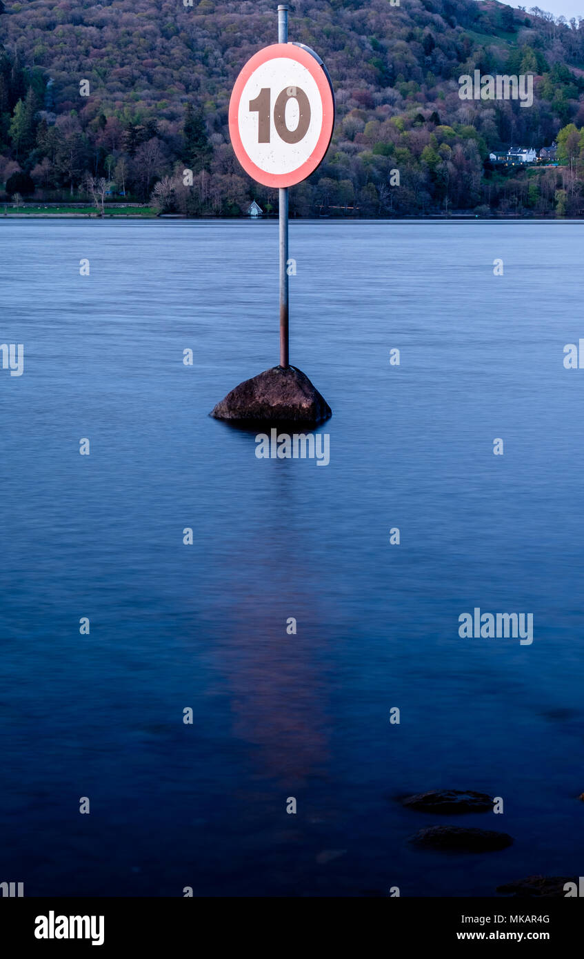 Speed restriction sign in lake at Windermere, near Fishery How, Low