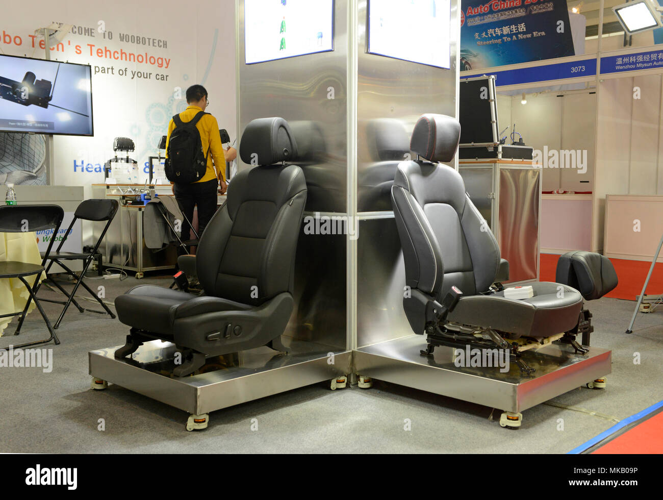 A pair of car seats on display at the Auto China 2018 motorshow in
