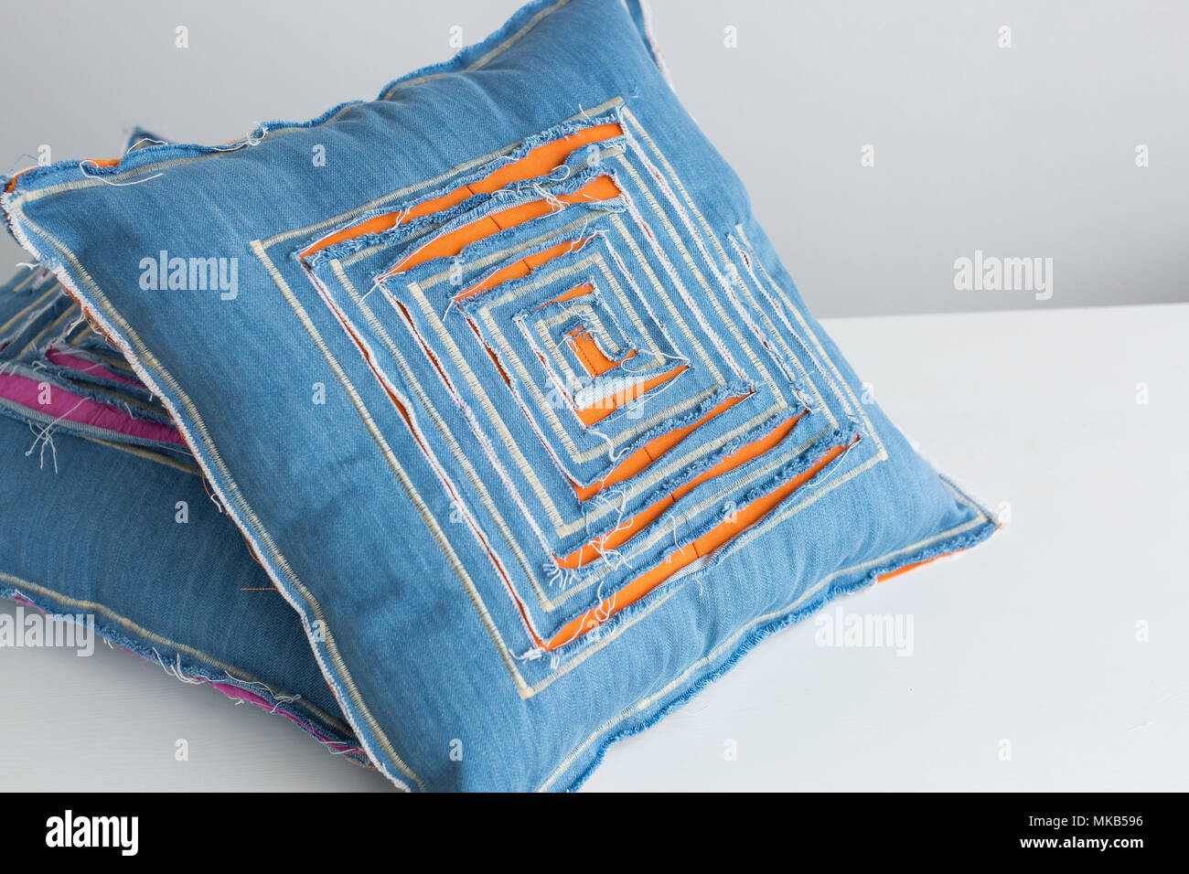handmade, interior design, craft concept. close up of stylish pillows