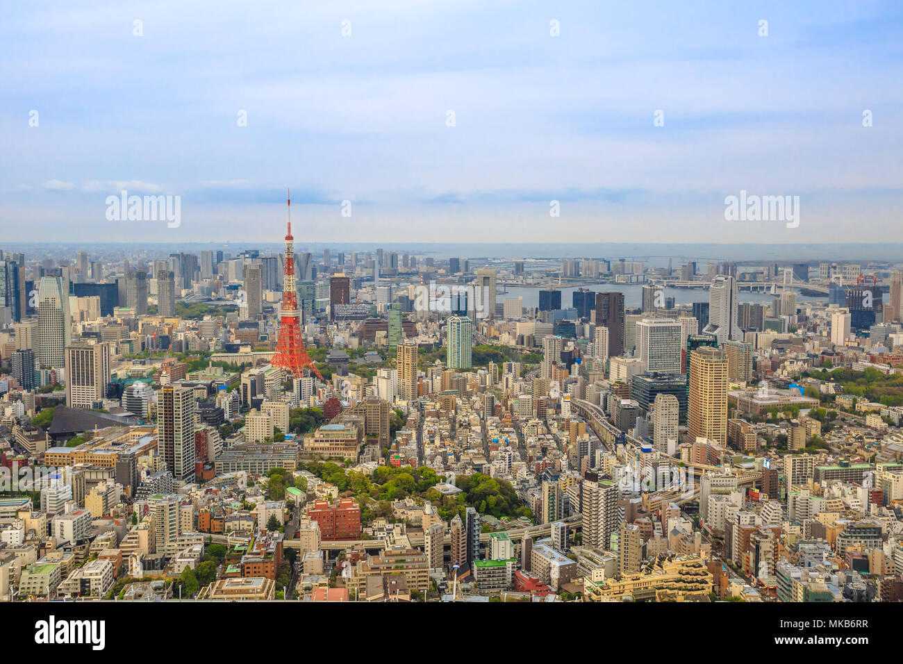 Aerial view of Tokyo Skyline at iconic Tokyo Tower from Mori Tower, the modern skyscraper and tallest building of Roppongi Hills complex in Minato District, Tokyo, Japan. Stock Photo
