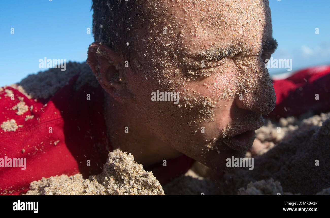 171104-N-PJ969-1279 FORT PIERCE, Fla., (Nov. 4, 2017) Multiple Central Florida area U.S. Naval Sea Cadet Corps divisions participate in beach physical training on the same beach that is recognized as the birth place of the U.S. Navy SEALs. From 1943 to 1946, thousands of volunteers were trained here as members of Naval Combat Demolition Units and Underwater Demolition Teams, the precursors to the SEALs. (U.S. Navy photo by Petty Officer 1st Class Abe McNatt) Stock Photo